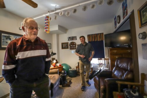 Two people standing